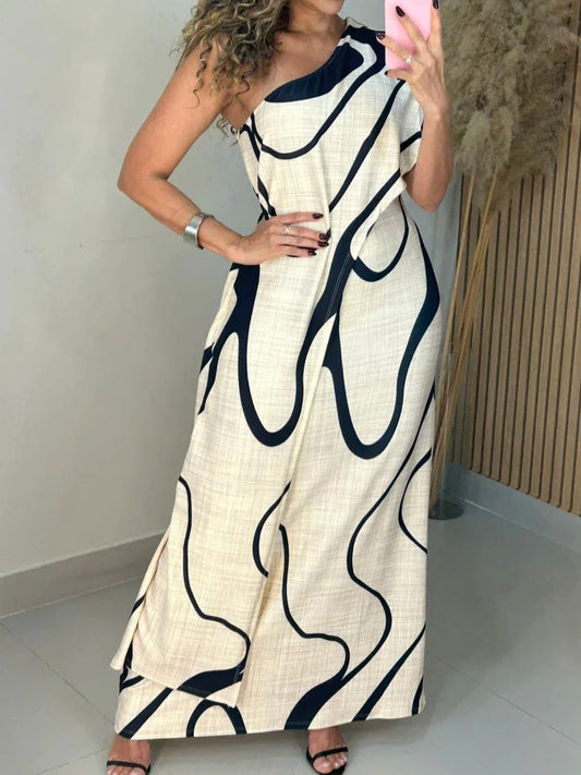 Vestido largo con hombros descubiertos y estampado abstracto